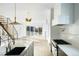 Open kitchen view with stainless appliances and access to a stunning living space at 5392 Lions Paw St, Castle Rock, CO 80104