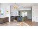 Modern kitchen with a large island, stainless steel appliances, and pendant lighting at 5392 Lions Paw St, Castle Rock, CO 80104