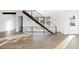 View of the staircase with wood treads and metal railings at 5392 Lions Paw St, Castle Rock, CO 80104