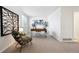 Home office with a large window providing natural light and neutral decor at 12860 E Dickensen Pl, Aurora, CO 80014