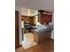 Functional kitchen with stainless steel appliances and ample countertop space for food preparation at 8278 Cherokee St, Denver, CO 80221