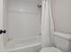 Modern bathroom features a subway tile shower and bathtub at 9700 E Iliff Ave # 81, Denver, CO 80231