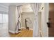 Walk-in closet with curtain, lighting, and wood floor at 9700 E Iliff Ave # 81, Denver, CO 80231