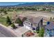 Charming two-story home with a three-car garage, landscaped yard, and well-maintained exterior at 17050 Park Trail Dr, Monument, CO 80132
