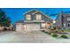 Charming two-story home with a three-car garage and well-maintained landscaping at 17050 Park Trail Dr, Monument, CO 80132