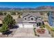 Inviting two-story home with three-car garage, landscaped front yard, and well-maintained exterior at 17050 Park Trail Dr, Monument, CO 80132