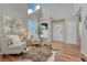 Bright foyer with soaring ceilings, wood floors, and stylish decor at 17050 Park Trail Dr, Monument, CO 80132