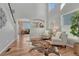 Spacious foyer with arched openings, hardwood floors, and contemporary accents at 17050 Park Trail Dr, Monument, CO 80132
