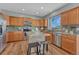 Updated kitchen boasts stainless appliances, granite counters, and convenient island seating at 17050 Park Trail Dr, Monument, CO 80132