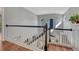Staircase to second floor featuring a combination of dark wood and white trim at 17050 Park Trail Dr, Monument, CO 80132