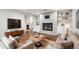 Cozy living room with a stylish fireplace, hardwood floors, and contemporary furniture creating a relaxing ambiance at 2777 S Adams St, Denver, CO 80210