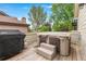 Backyard deck featuring a hot tub, grill, and outdoor living space at 1181 E 130Th Pl, Thornton, CO 80241