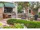 Cozy front porch with outdoor seating, decorative plants, and an awning, creating a relaxing outdoor space at 1181 E 130Th Pl, Thornton, CO 80241