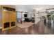 Finished basement featuring a large built-in entertainment center and foosball table at 2349 Hickory Pl, Erie, CO 80516