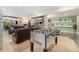 Basement with a spacious game area, foosball table, and cozy living space at 2349 Hickory Pl, Erie, CO 80516