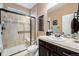 Well-lit bathroom featuring a glass-enclosed shower and stylish vanity, creating a spa-like retreat at 2349 Hickory Pl, Erie, CO 80516