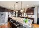 Gourmet kitchen with granite countertops, stainless steel appliances, and ample storage at 2349 Hickory Pl, Erie, CO 80516