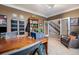 Cozy home office featuring dark wood furnishings and decor, with an adjacent staircase visible at 2349 Hickory Pl, Erie, CO 80516