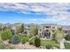 Beautifully landscaped backyard featuring patios and outdoor living space perfect for entertaining and relaxation at 2349 Hickory Pl, Erie, CO 80516