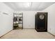 Basement with large sauna unit and shelving for storage offering versatile space for hobbies or exercise at 8773 W Cornell Ave # 10, Lakewood, CO 80227