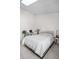 Cozy bedroom with soft lighting, record player, and clean design, ideal for relaxation at 8773 W Cornell Ave # 10, Lakewood, CO 80227