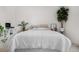 Minimalist bedroom with a comfortable bed, simple decor, and ample natural light at 8773 W Cornell Ave # 10, Lakewood, CO 80227
