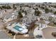 Overhead shot highlighting community pool, clubhouse, and meticulously maintained grounds of this townhome community at 8621 E Dry Creek Rd # 325, Englewood, CO 80112