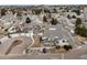 An aerial view highlighting the townhome community, parking, and beautiful common areas around the neighborhood at 8621 E Dry Creek Rd # 325, Englewood, CO 80112