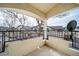 Balcony with wrought iron railings offering neighborhood views at 8621 E Dry Creek Rd # 325, Englewood, CO 80112