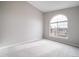 Bright, unfurnished bedroom with neutral walls and a large window providing ample natural light at 8621 E Dry Creek Rd # 325, Englewood, CO 80112