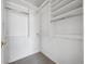 Walk-in closet with built-in shelving, offering ample storage at 8621 E Dry Creek Rd # 325, Englewood, CO 80112