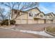 Spacious townhome with garages, ample parking, and a well-kept exterior at 8621 E Dry Creek Rd # 325, Englewood, CO 80112