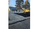Charming single-story home features a freshly mulched front yard, new fence, and a neatly manicured driveway at 655 S Osceola St, Denver, CO 80219