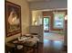 Inviting dining area featuring hardwood floors and a stylish table setting at 3616 N Gilpin St, Denver, CO 80205