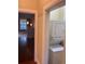 View through a hallway showing a stacked washer and dryer at 3616 N Gilpin St, Denver, CO 80205