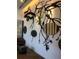 Artistic wall decor featuring tree branch designs and round birchwood accents in a well-lit room at 3616 N Gilpin St, Denver, CO 80205