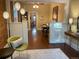 Cozy living room featuring hardwood floors, exposed brick, and stylish decor at 3616 N Gilpin St, Denver, CO 80205