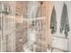 Modern bathroom with a walk-in shower and updated fixtures at 1663 Devils Point Pl, Highlands Ranch, CO 80126