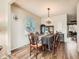 Dining area with hardwood floors, and a classic wooden dining set at 1663 Devils Point Pl, Highlands Ranch, CO 80126