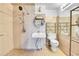 Accessible bathroom with a walk-in shower, modern fixtures, and neutral tiles, designed for comfort and convenience at 13270 W 65Th Ave, Arvada, CO 80004