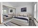 Stylish bedroom with large mirror, soft lighting, and modern décor at 13270 W 65Th Ave, Arvada, CO 80004