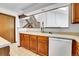 Functional kitchen with updated cabinets, sink, and modern appliances at 13270 W 65Th Ave, Arvada, CO 80004