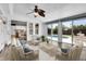 Relaxing sunroom with comfortable seating and access to the pool at 13270 W 65Th Ave, Arvada, CO 80004