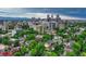 Panoramic aerial view of the city skyline surrounded by lush greenery at 549 N Ogden St, Denver, CO 80218