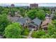 Aerial shot of the home showcasing its curb appeal and mature trees at 549 N Ogden St, Denver, CO 80218