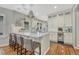 Bright kitchen with a marble island, modern appliances, and ample cabinet space at 549 N Ogden St, Denver, CO 80218