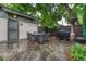 Cozy patio area features flagstone, outdoor seating, and a barbecue grill at 549 N Ogden St, Denver, CO 80218