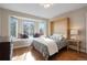 Cozy bedroom featuring a window bench and natural light at 8903 Edgewood St, Highlands Ranch, CO 80130