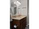 Bathroom boasts a double sink vanity with granite countertops, modern lighting, and ample cabinet space at 2854 N Lowell Blvd, Denver, CO 80211