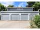 Large four-car garage providing ample parking and storage space with easy access at 2854 N Lowell Blvd, Denver, CO 80211